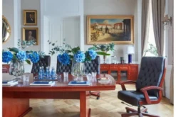 Poltrona direzionale da ufficio in pelle nera Consul