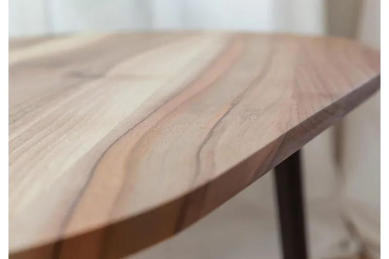 Tavolino moderno ovoidale in legno massello naturale di noce